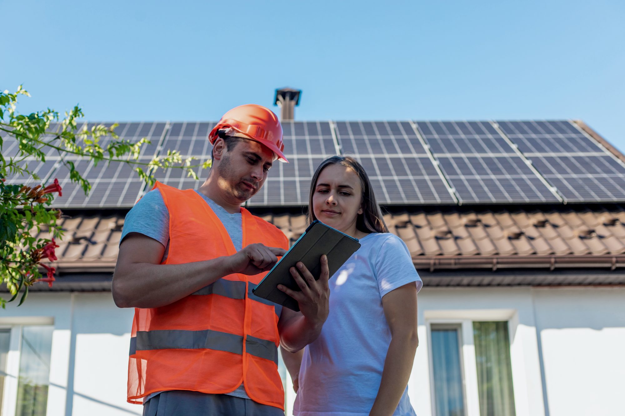 Solar contractor installing rooftop panels